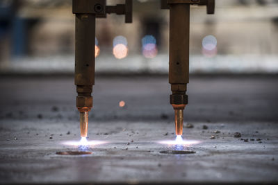 Closup on laser cutting of sheet metal.