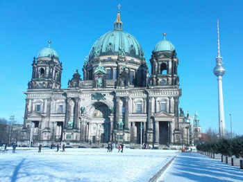 Low angle view of berlin cathedral against sky during winter