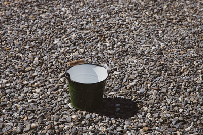 High angle view of coffee on rock