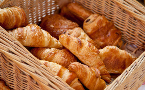 Freshly baked croissants in basket