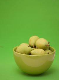 Close-up of fruits in bowl on table