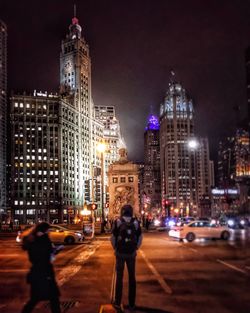 View of city lit up at night