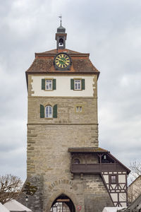 Low angle view of clock tower against sky