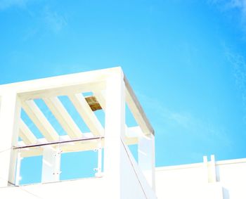 Low angle view of built structure against blue sky