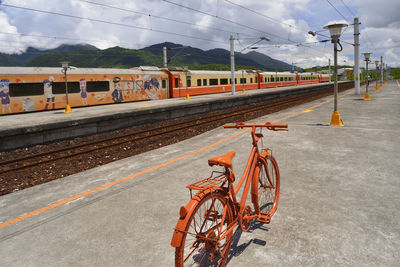 Train on railroad station platform against sky