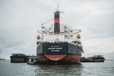 View of ship in sea against sky