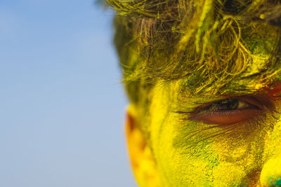 Close-up of man with powder paint on face