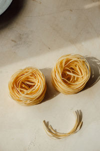 Food face fromhomemade pappardelle pasta is smiling face. recipes for children's pasta dishes