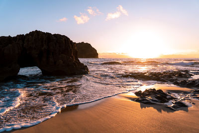 Scenic view of sea against sky during sunset