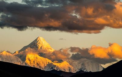 Scenic view of mountains against sky during sunset