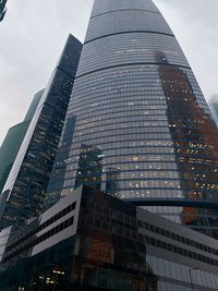 Low angle view of modern buildings in city