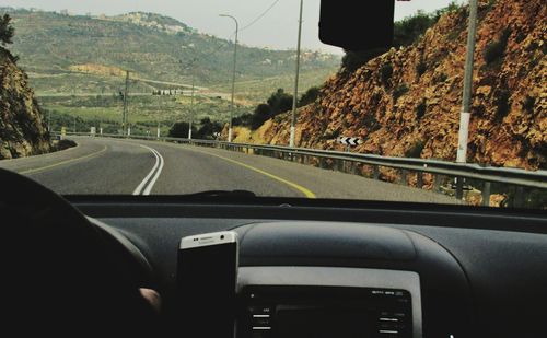 View of road through car windshield