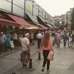 People at market stall