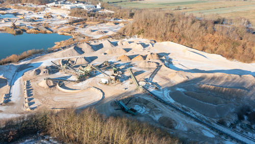 Gravel quarrying in a gravel pit during a drone flight