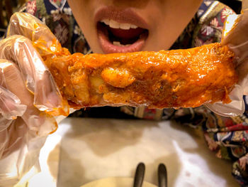 Close-up of man eating food