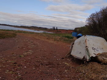 Close-up of field against sky