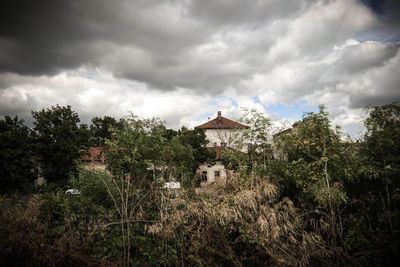 Built structure against cloudy sky