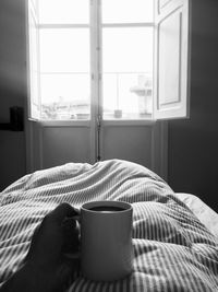 Coffee cup on table at home