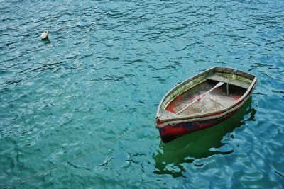 High angle view of abandoned boat moored in sea