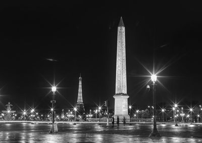 Low angle view of illuminated city at night