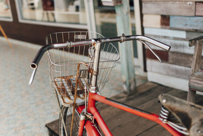 Close-up of empty bicycle against wall