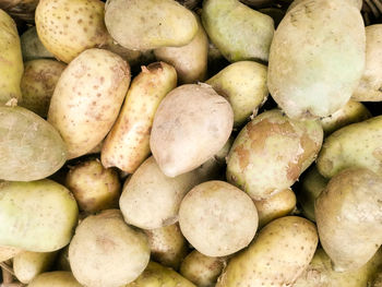 Full frame shot of onions for sale at market stall