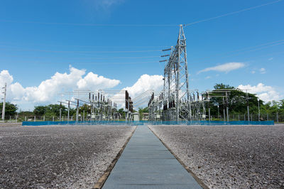 Surface level of road against blue sky