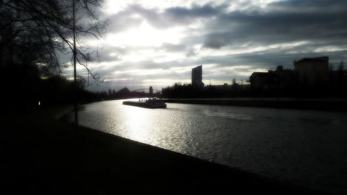 View of river against cloudy sky