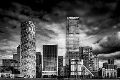 Modern buildings against sky in city