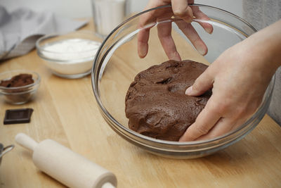 High angle view of person preparing food on table