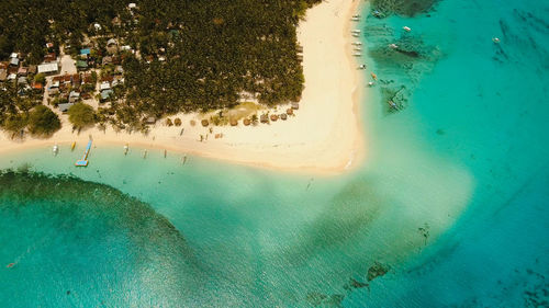 Aerial view of beautiful tropical island daco with white sand beach. 