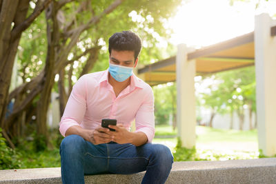 Young man using mobile phone