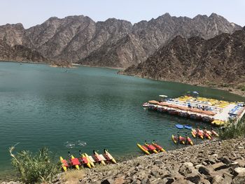 High angle view of deck chairs on shore