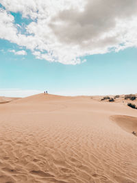 Scenic view of desert against sky