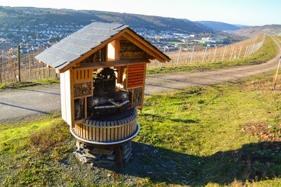 Built structure on landscape against sky