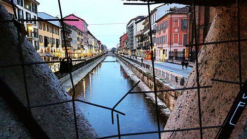 View of canal in city