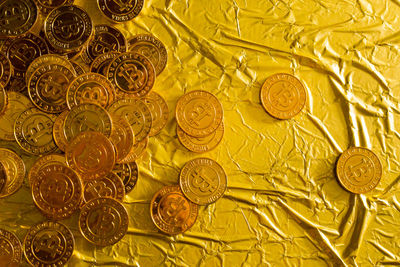 Bitcoins on golden paper