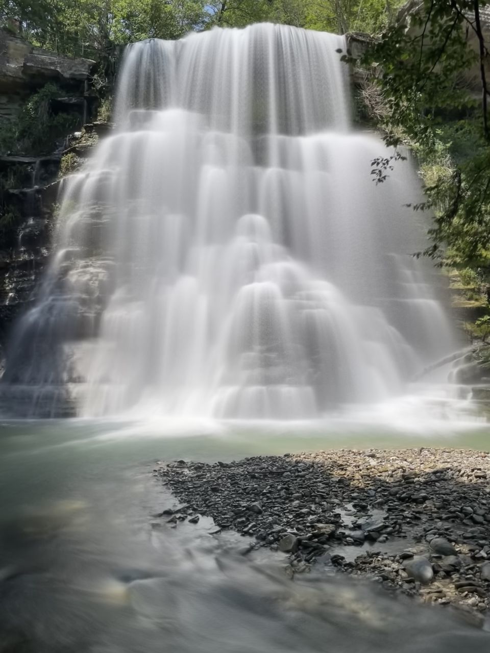 waterfall, water, beauty in nature, scenics - nature, motion, tree, body of water, environment, nature, plant, long exposure, forest, land, rock, blurred motion, no people, flowing water, outdoors, travel destinations, water feature, flowing, watercourse, landscape, non-urban scene, tourism, travel, idyllic, river