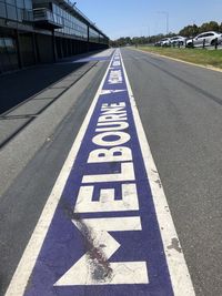 Surface level of arrow symbol on road in city