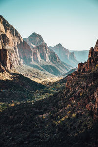 Scenic view of rocky mountains against clear sky