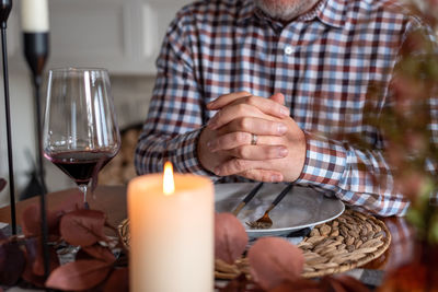 Midsection of man preparing food