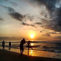 Scenic view of sea at sunset