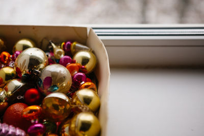 Close-up of multi colored balls on table