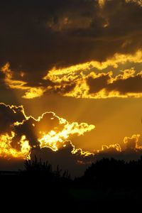 Scenic view of silhouette landscape against sky during sunset