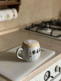 High angle view of coffee cup on table