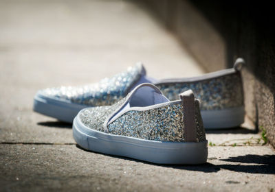 Close-up view of summer shoes with glitter 