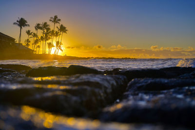 Scenic view of sea against sky during sunset