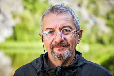 Portrait of man wearing eyeglasses