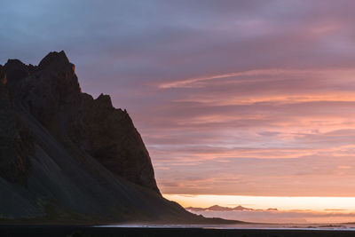 Scenic view of mountains at sunset