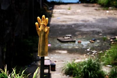 Close-up of painting on tree by street